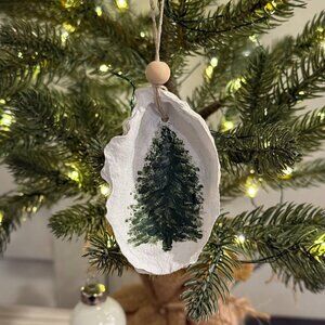 Handmade by Posher! Hand-painted oyster shell Christmas ornaments.